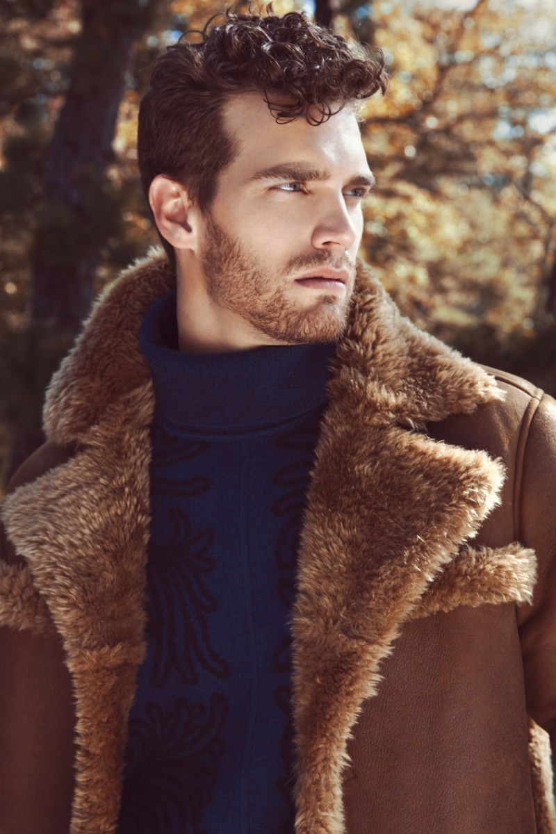 Sean wears fur lined coat John Varvatos and turtleneck Louis Vuitton.