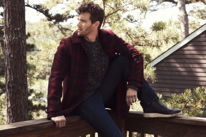 Sean wears plaid jacket Valentino, sweater Bottega Veneta, jeans Dsquared2 and boots Bally.