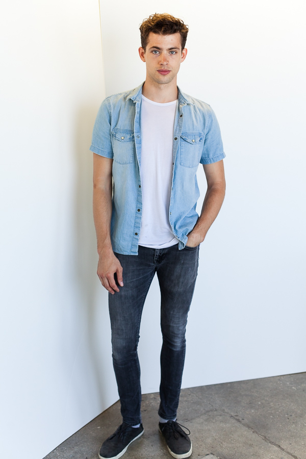 Jamie Wise stops by his Los Angeles modeling agency for a digital update. The Vision model stays casual in a denim on denim ensemble as he poses for casual new photos.