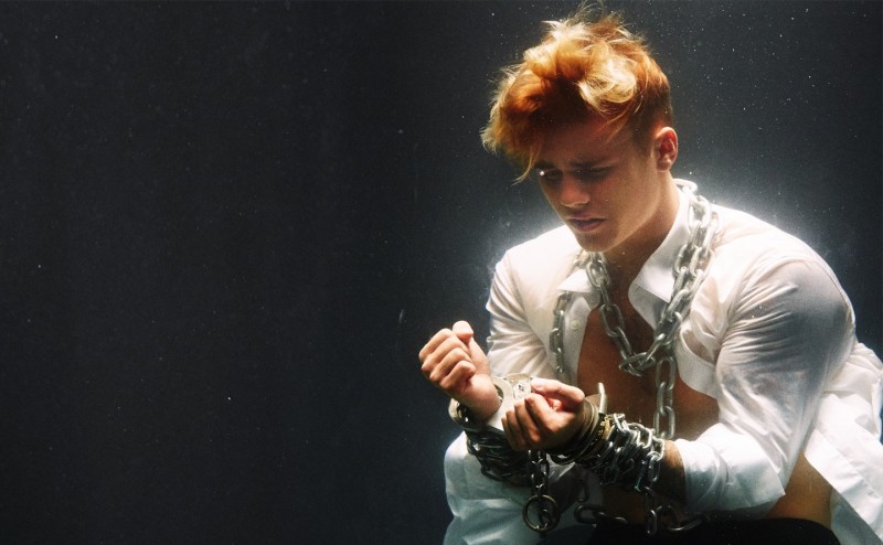 Justin Bieber is chained up for his Complex photo shoot.