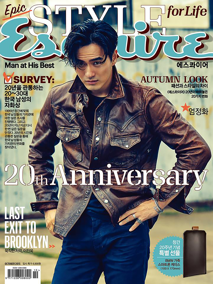 Esquire Korea celebrates its twenty year anniversary with its October 2015 cover star, Lee Jin-wook. The Korean actor covers the magazine in an essential brown leather jacket, paired with blue denim jeans.