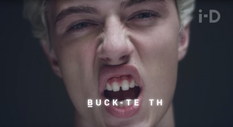 Lucky Blue Smith flashes his buckteeth. 