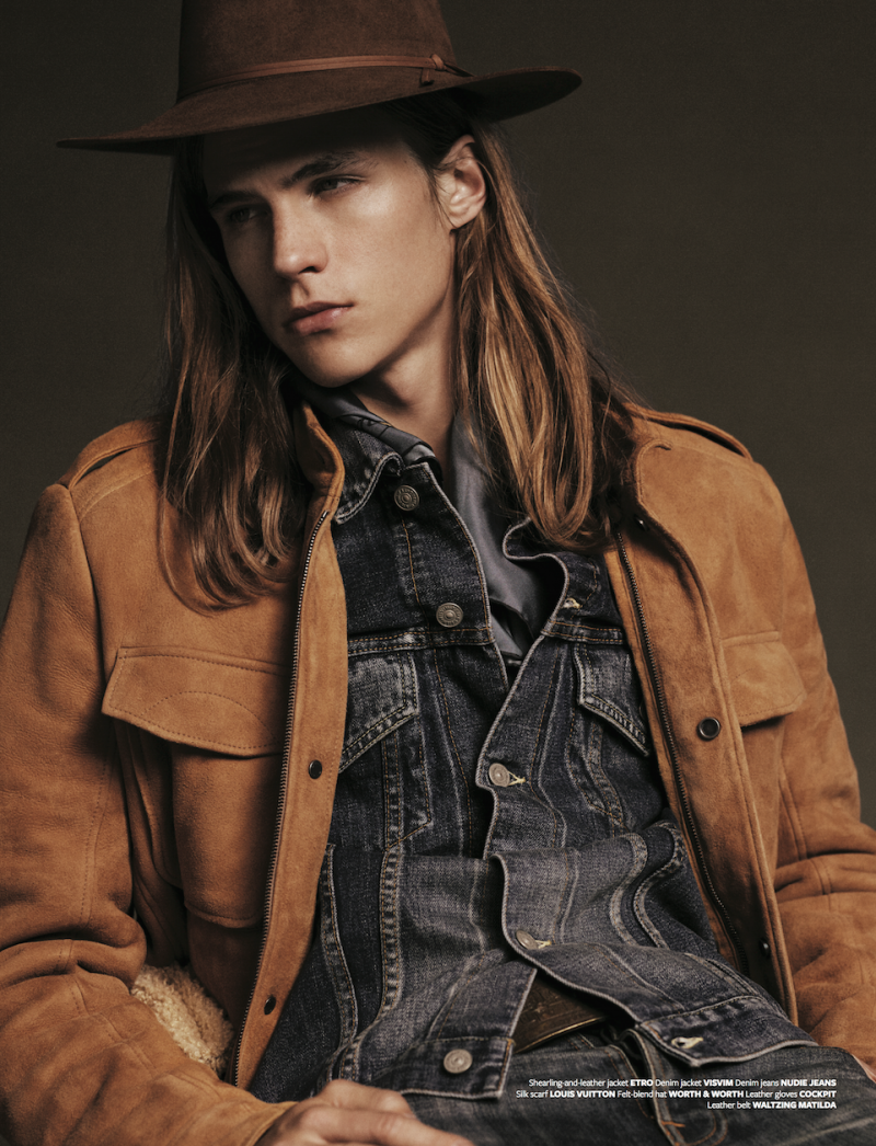 Malcolm Lindberg sports a western-style hat with denim and a brown suede jacket for At Large magazine.