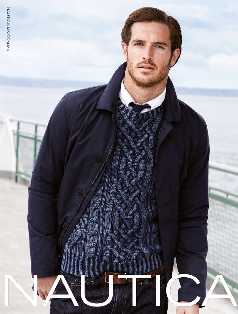 Justice Joslin is once again the face of Nautica as the model stars in the brand's fall-winter 2015 campaign. Photographed outdoors, Justice layers up for fall in a medium-weight jacket and a cable-knit sweater, worn over a shirt and tie.