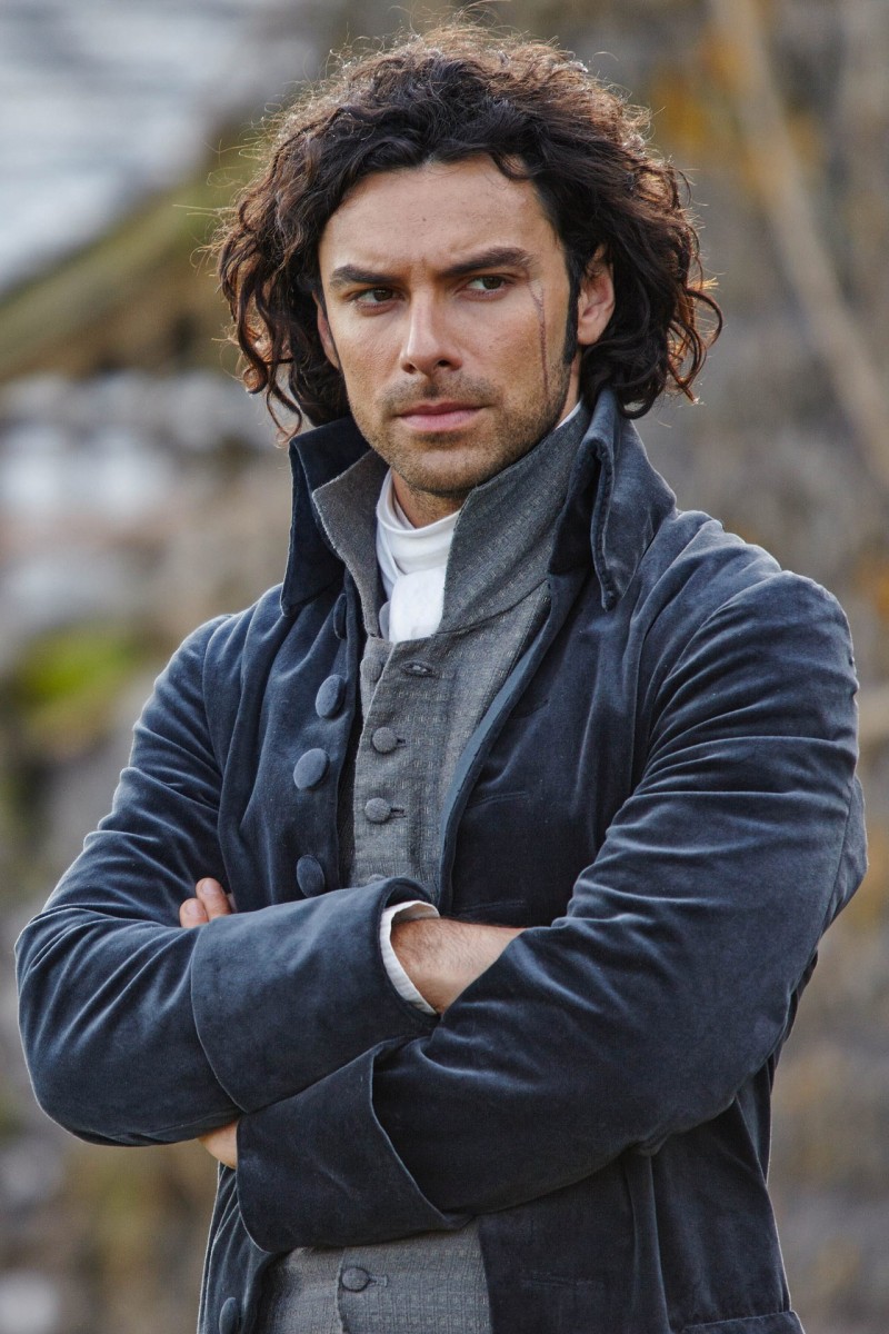 Embracing dramatic tailoring, Ross Poldark (Aidan Turner) wears men's separates with strong necklines.