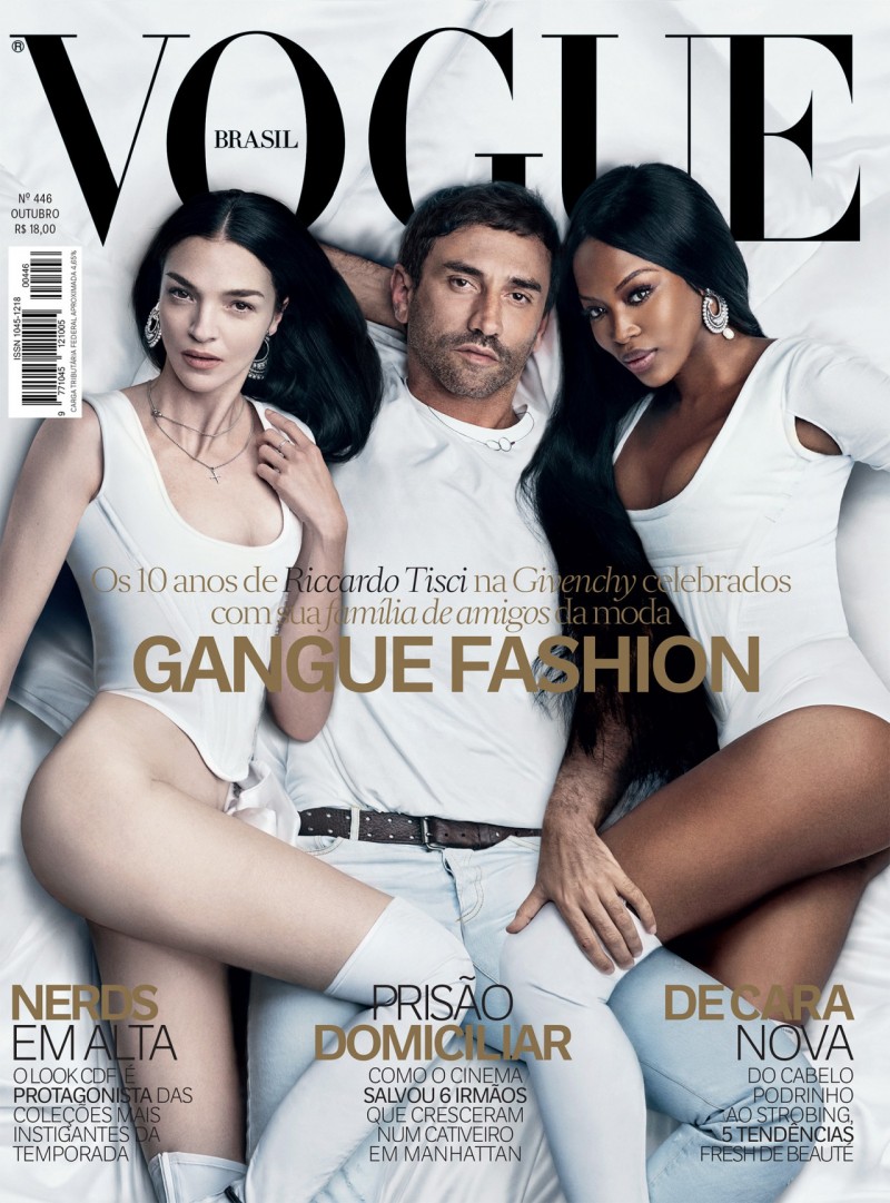 Givenchy creative director Riccardo Tisci is becoming quite the regular cover star. After gracing the cover of Madame Figaro, Tisci is front and center for Vogue Brazil's October 2015 issue. Laying in bed in a white ensemble, Tisci is joined by top models MariaCarla Boscono and Naomi Campbell. / Photo by Luigi & Iango.