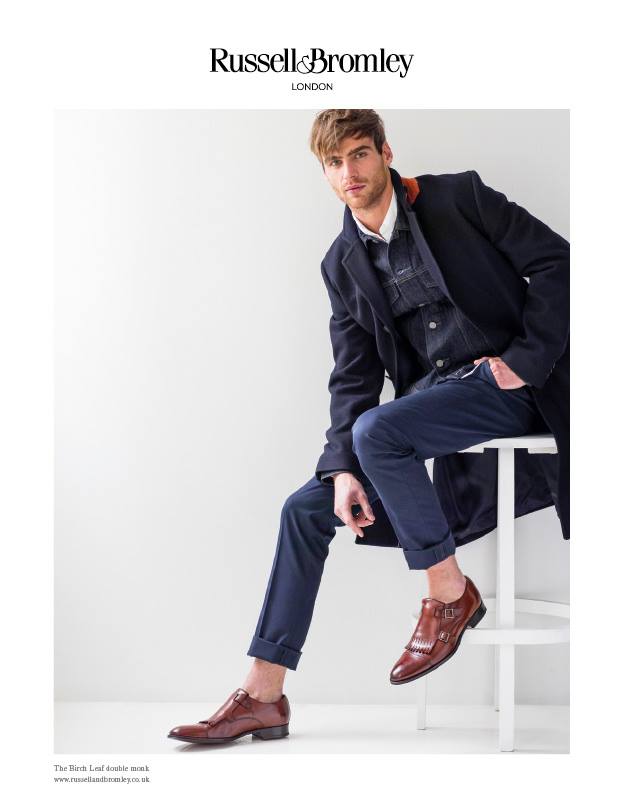 Photographed by Martyn Thompson, Select model George Alsford takes a seat for Russell & Bromley's fall-winter 2015 campaign. Highlighting the footwear label's dress shoes, George brings a classic style into the contemporary age with a semi-casual ensemble.