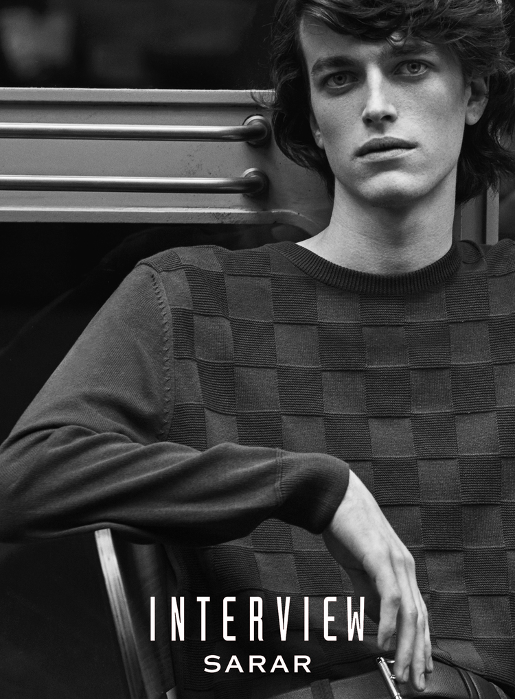 Reuben Ramacher models a checker print inspired knit.