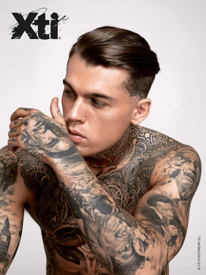 Stephen James goes shirtless, showing off his tattoos for XTI's fall-winter 2015 campaign.