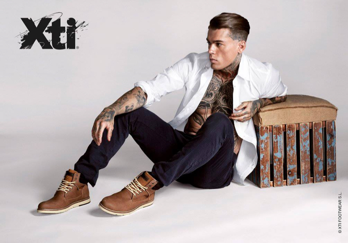 Posing in a clean white dress shirt, Stephen James shows off a pair of XTI's latest sneakers in the brand's fall-winter 2015 campaign.