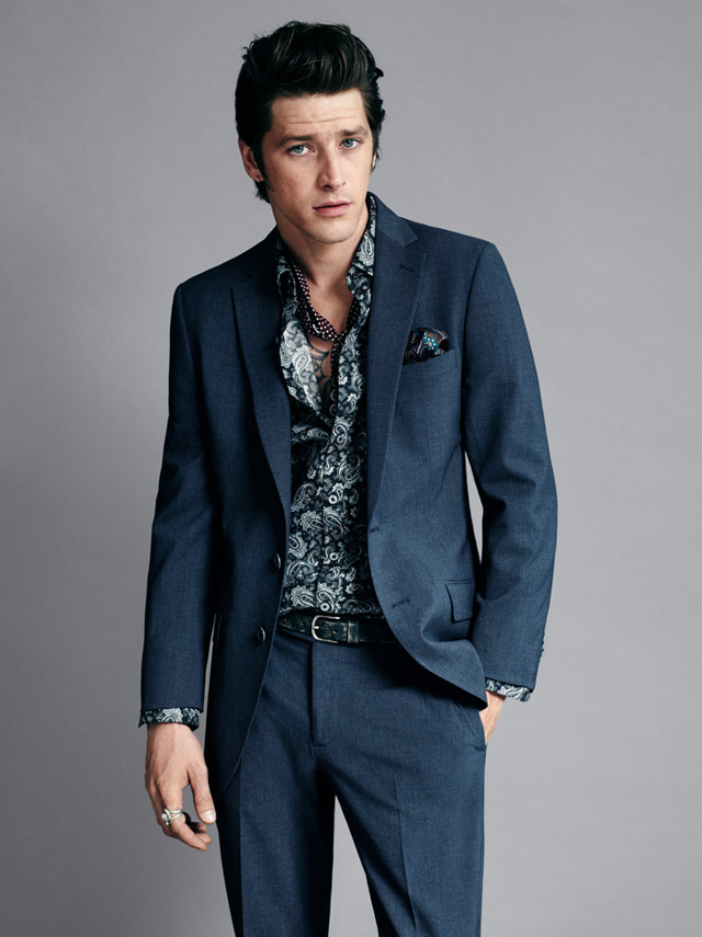 Vinnie Woolston dons a navy Mango suit.