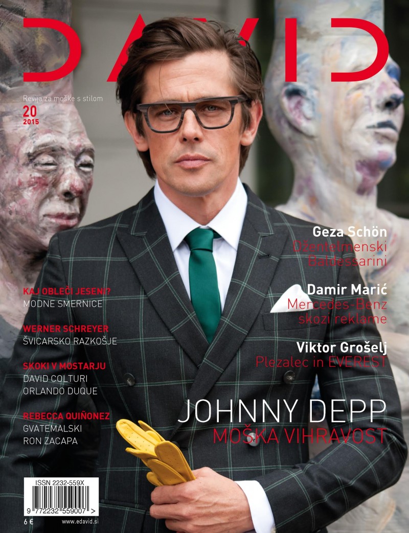 Werner Schreyer covers David magazine in a sharp double-breasted windowpane jacket.