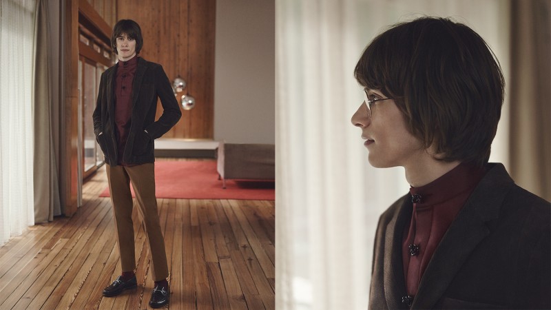 Oscar Robertson wears slim-fit corduroy blazer Sacai, stand-collar shirt J.W. Anderson, slim-fit cotton twill trousers Maison Martin Margiela and horsebit leather loafers Gucci.