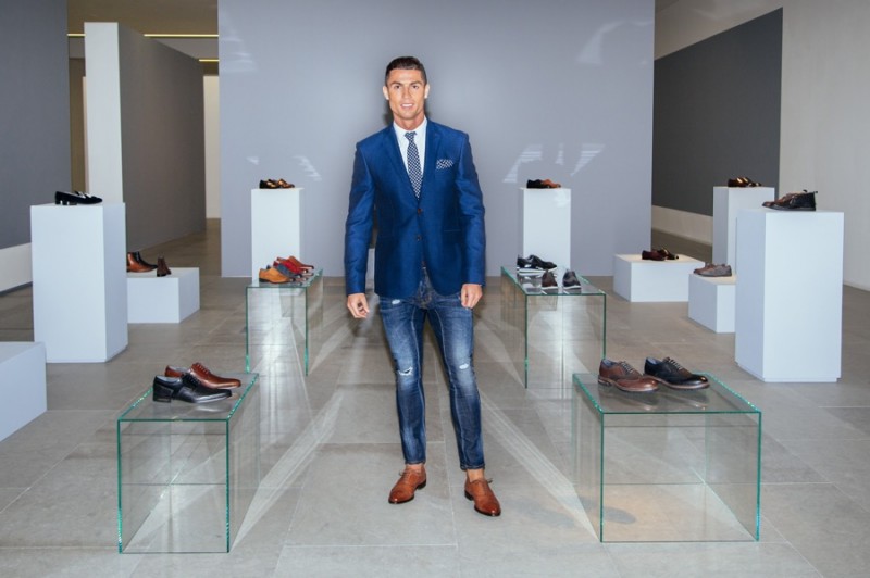 Cristiano Ronaldo poses for pictures with his latest CR7 Footwear collection.