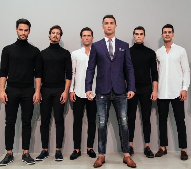 Cristiano Ronaldo poses with models at his debut runway show for CR7 Footwear.