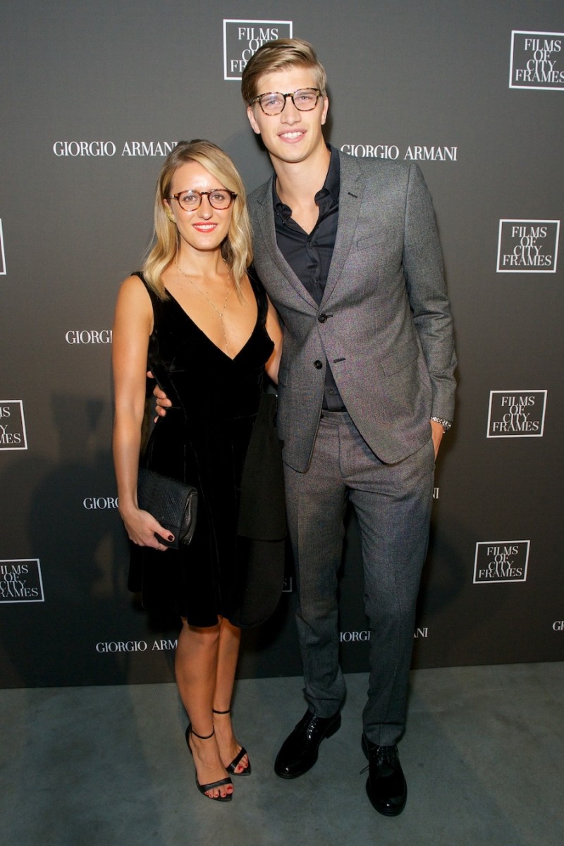 Toby Huntington-Whiteley and guest photographed at Giorgio Armani's Films of City Frames premiere.