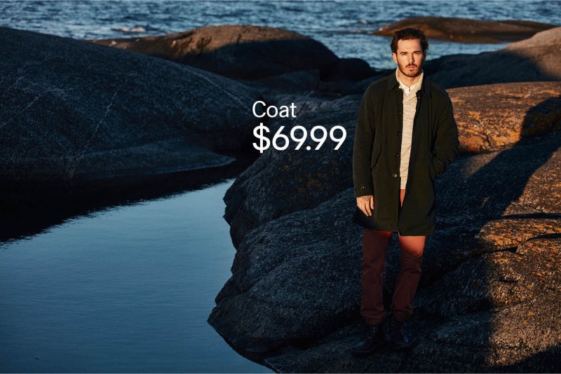 David Flinn steps out for H&M Men, wearing a sharp winter coat.