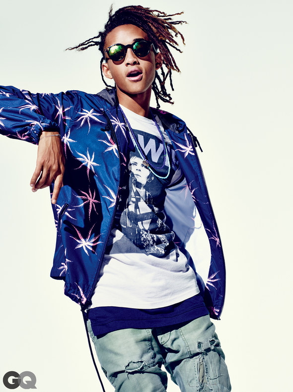 Jaden Smith wears jacket Marc by Marc Jacobs, t-shirt Bravado, tank John Elliott + Co., pants Greg Lauren, sunglasses Carrera and necklaces George Frost and Love Adorned.