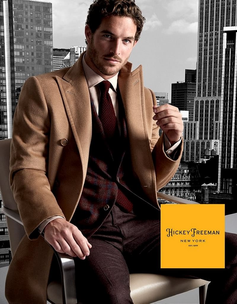 Justice Joslin dons a dashing camel coat from Hickey Freeman.