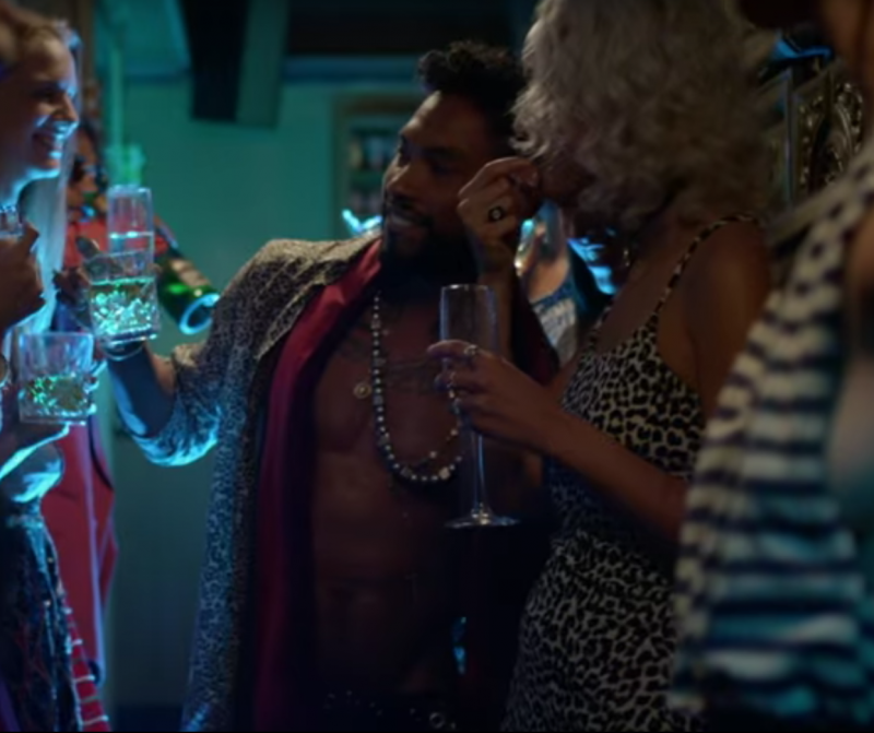 Miguel wears a leopard shirt for his Waves music video.