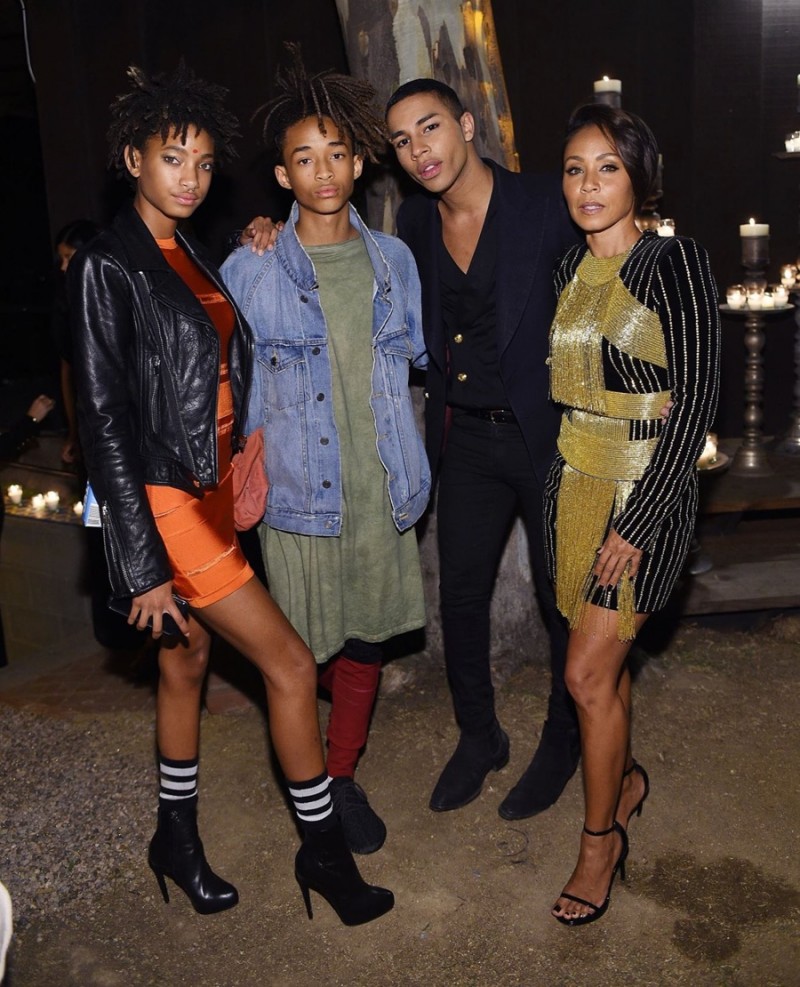 Willow and Jaden Smith pose for a photo with Olivier Rousteing and their mother Jada Pinkett Smith.