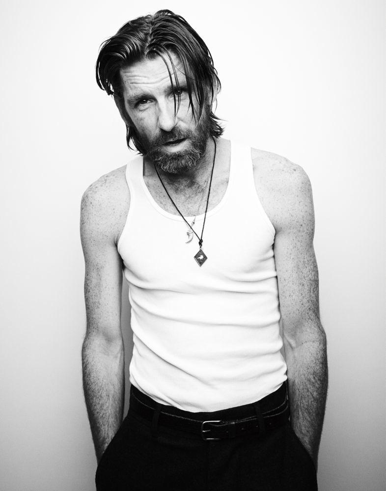 Actor Paul Anderson goes simple in a wifebeater.