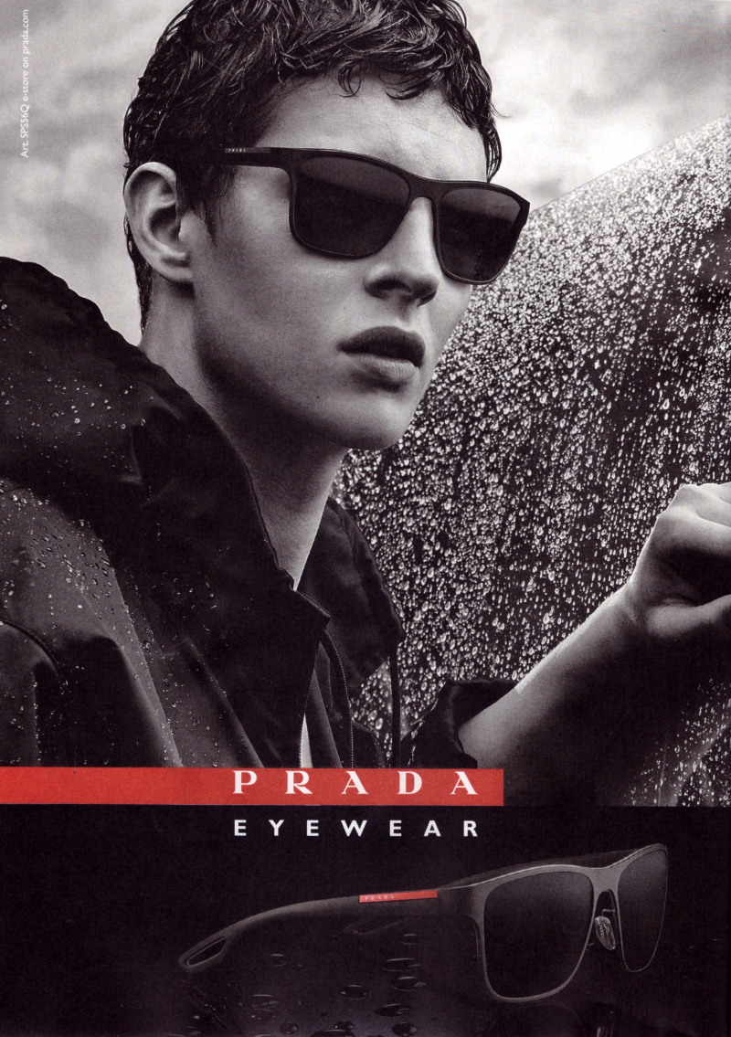 The face of Prada Luna Rossa Sport, model Tim Schuhmacher reunites with the Italian fashion house for its fall-winter 2015 eyewear campaign. Tim goes sporty for the black & white image, donning Prada's modern sunglasses with a windbreaker.