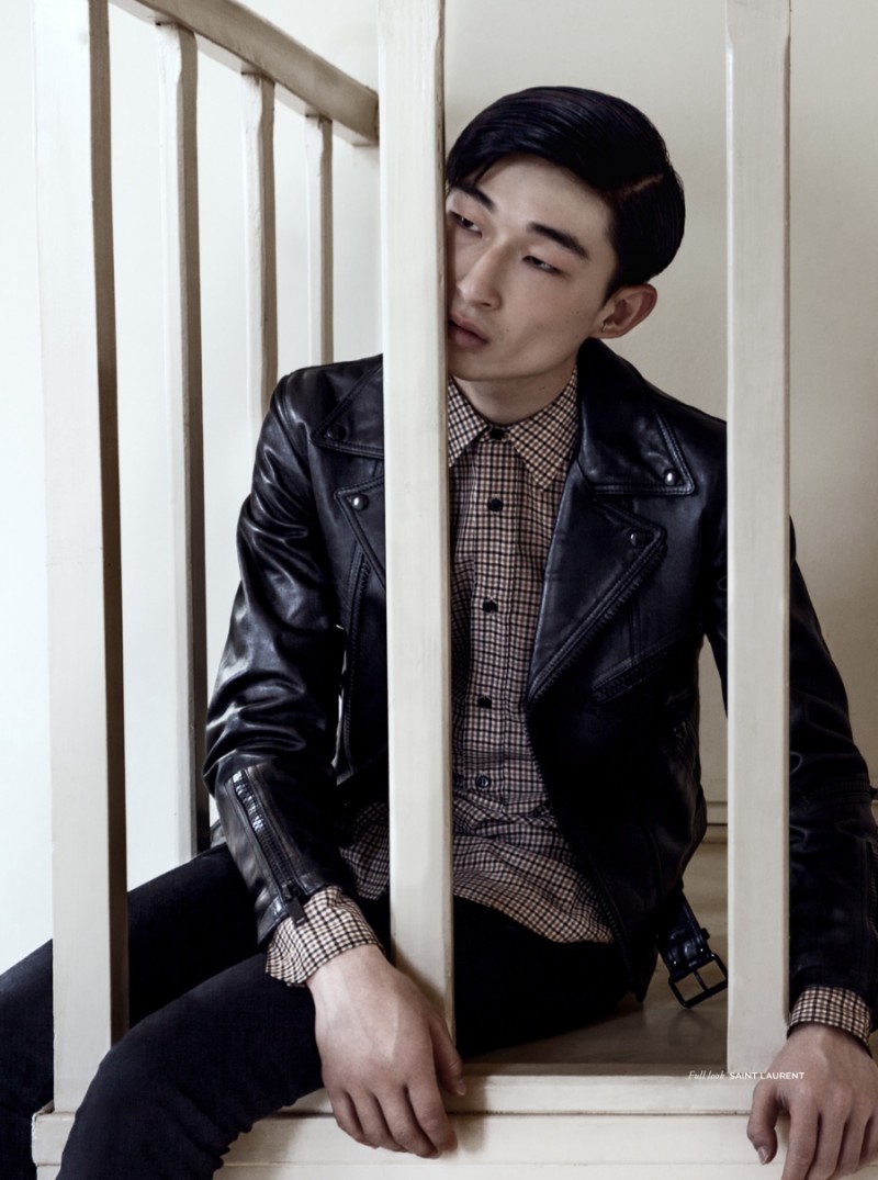 Sang Woo Kim sports a leather biker jacket from Saint Laurent.