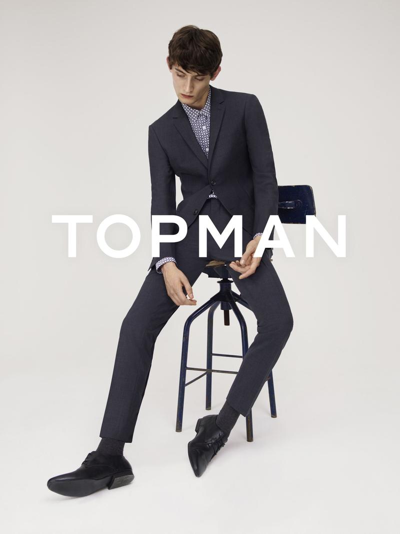Model Rory Cooper cuts a sharp figure as the star of Topman's fall-winter 2015 campaign. The British model dons suiting for the advertisement, which was photographed by Thomas Cooksey with styling by Luke Day.
