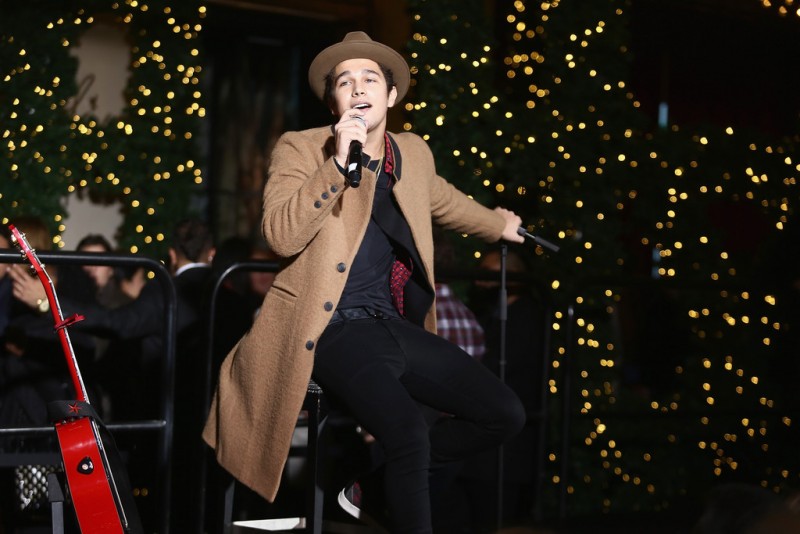 Austin Mahone performs during the unveiling of Lord & Taylor's holiday 2015 window in New York City.