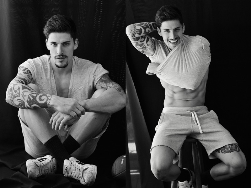 Danilo poses for a playful image in activewear. 
