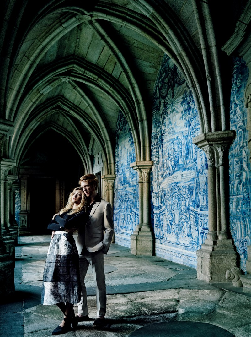 Domhnall Gleeson and Gigi Hadid pose for a photo at Sé do Porto cathedral.