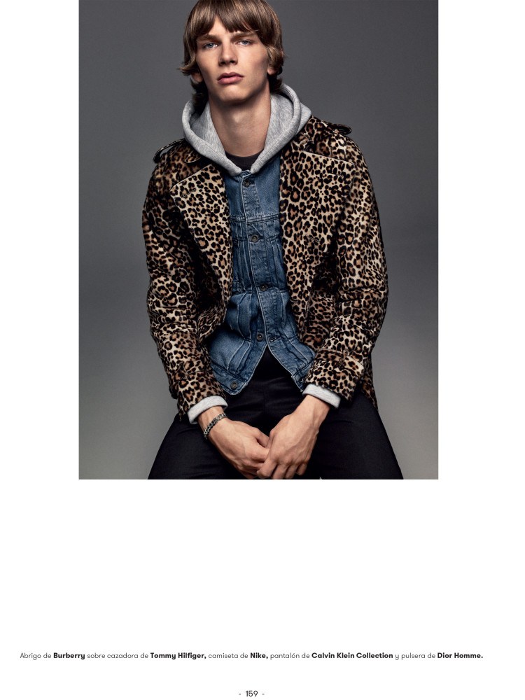 Erik makes a bold statement in a leopard jacket.