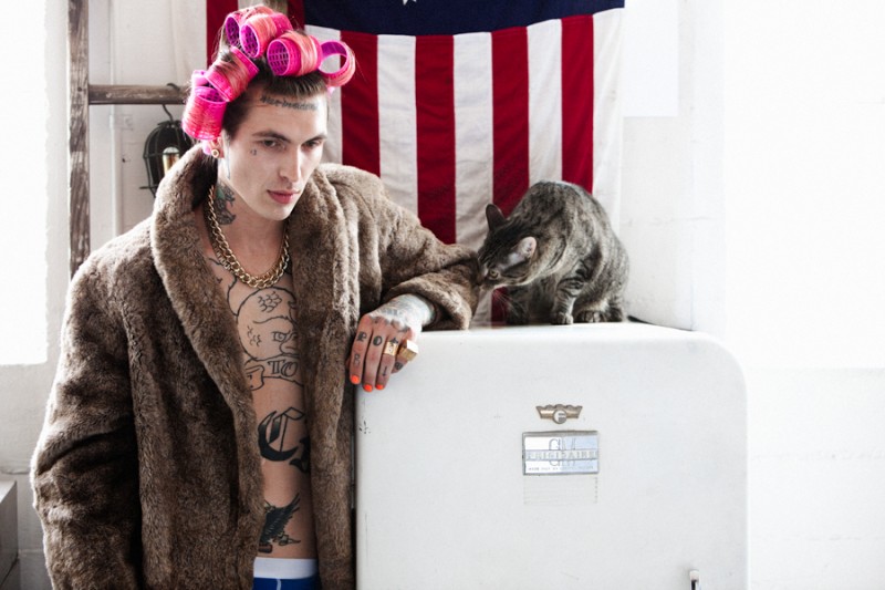 Showing off his playful personality, Bradley Soileau rocks curlers and a fur coat.