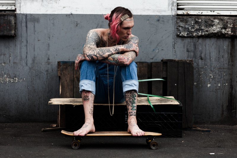 Bradley Soileau poses for a relaxed image outside.
