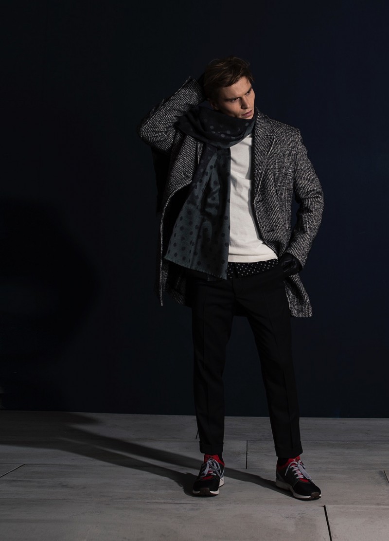Oliver wears coat Karl Lagerfeld, scarves Eton, turtleneck GANT, trousers Filippa K, sneakers Adidas, shirt and gloves J.Lindeberg.