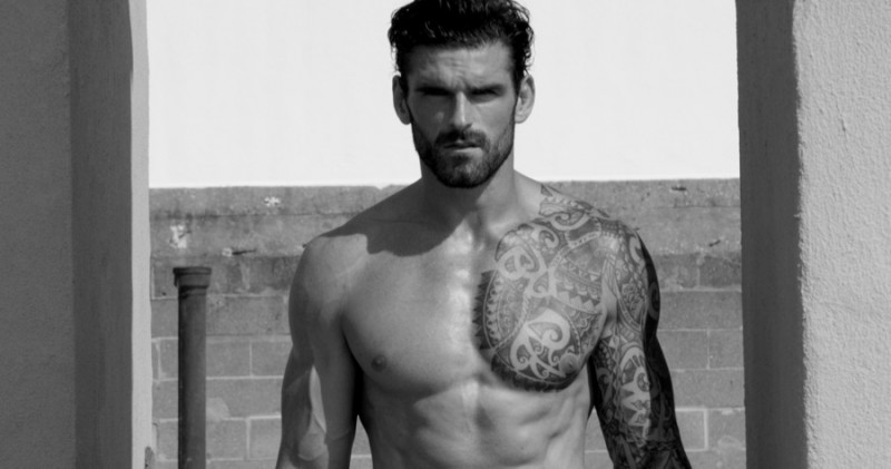 Stuart Reardon poses for a black & white picture by Bell Soto.