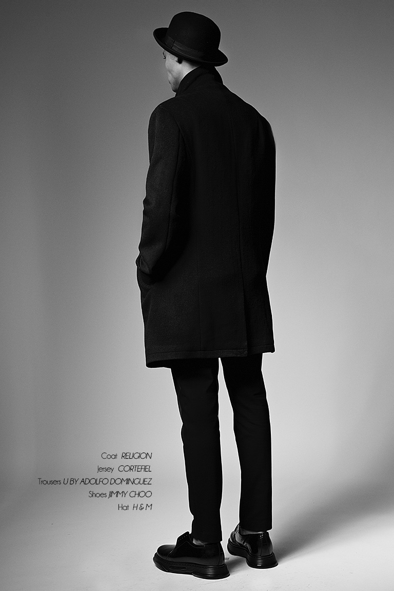 Sua wears coat Religion, trousers U by Adolfo Dominguez, shoes Jimmy Choo and hat H&M.