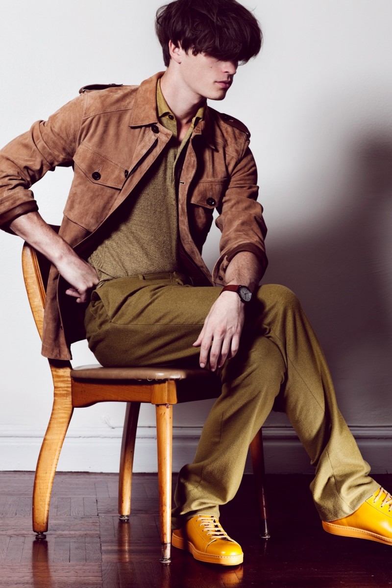 Taylor wears pants Raf & Olga, watch Skagen, shoes Santoni, jacket and polo Belstaff.