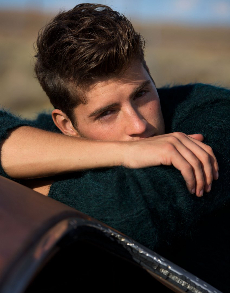 Gregg Sulkin has a quiet moment in a Tom Ford mohair sweater.
