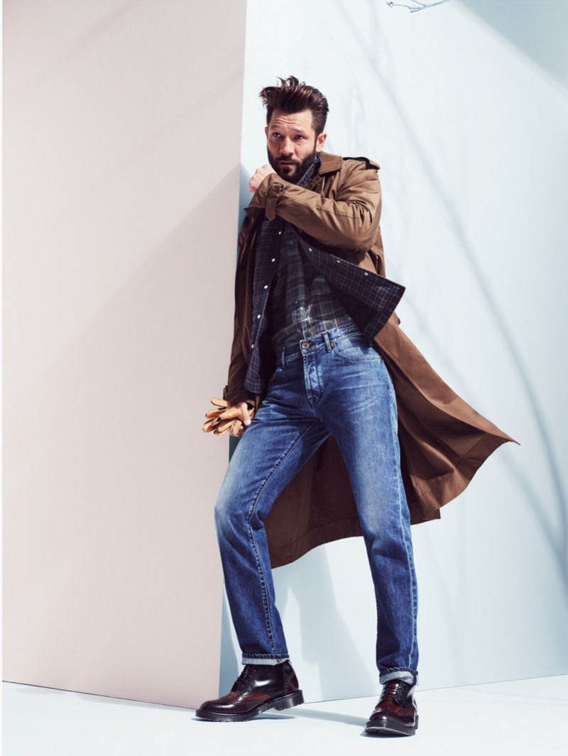An overcoat adds a stylish punch to a casual denim jeans and shirt look.