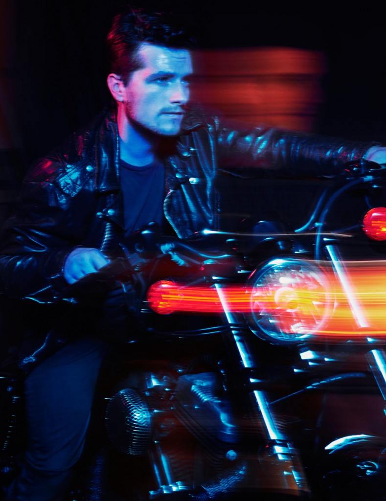 Captured on the back of a motorcycle, Josh Hutcherson sports a vintage leather jacket.