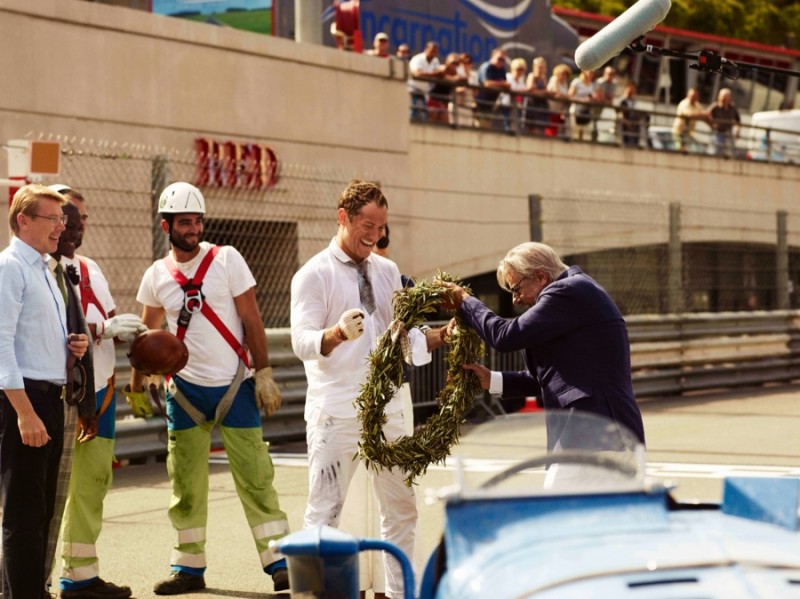 A victorious Jude Law on set with Giancarlo Giannini behind the scenes of The Gentleman’s Wager II, a short film on the joy of giving from Johnnie Walker Blue Label.