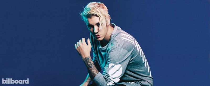 Justin Bieber rocks his current blond hairstyle as he poses for the lens of photographer Zoey Grossman for Billboard.