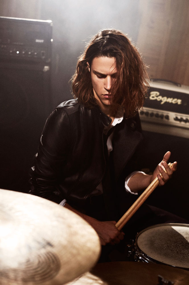 Model Miles McMillan is a drummer for Armani Exchange's winter 2015 campaign.