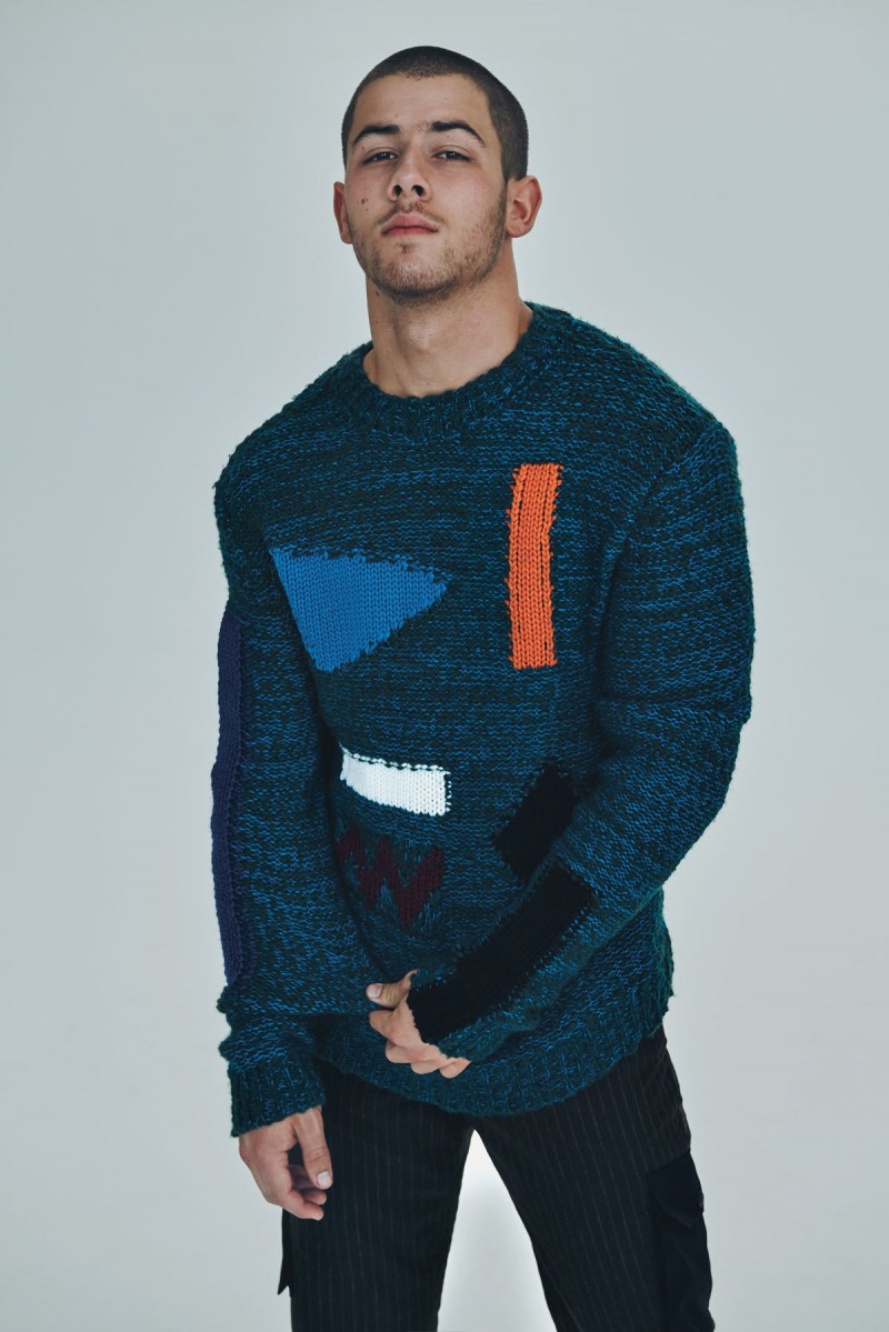 Nick Jonas rocks a quirky sweater for his i-D shoot.