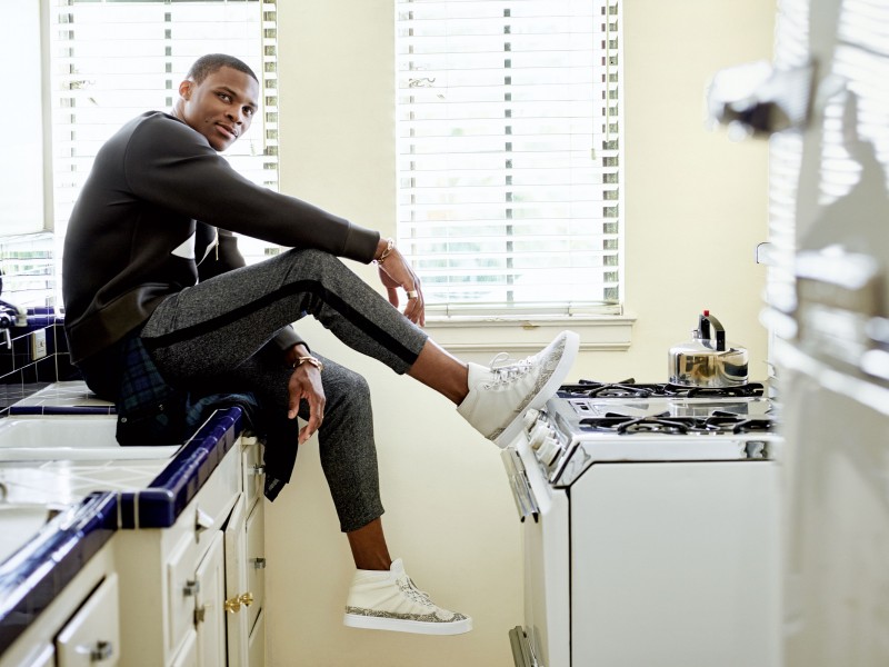 Russell Westbrook wears sweatshirt Neil Barrett, pants Public School and shoes his own.