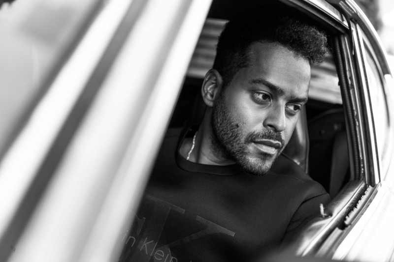Twin Shadow poses for a relaxed image in Calvin Klein.