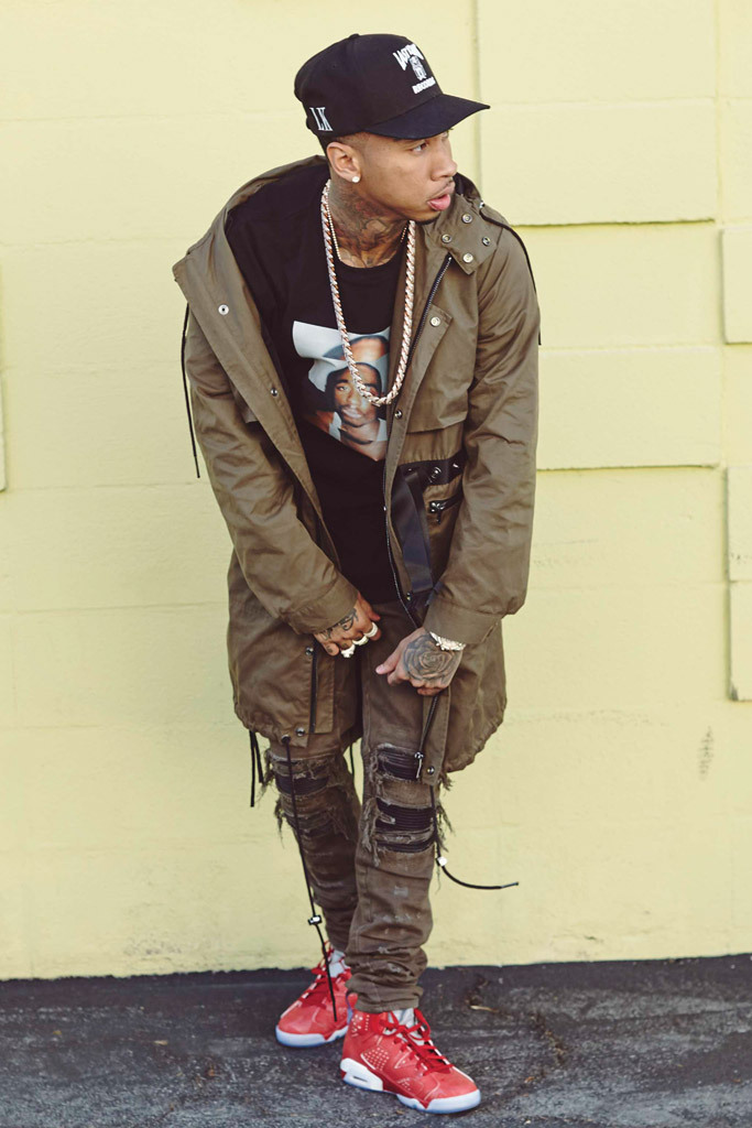 Tyga rocks a Tupac Shakur t-shirt.