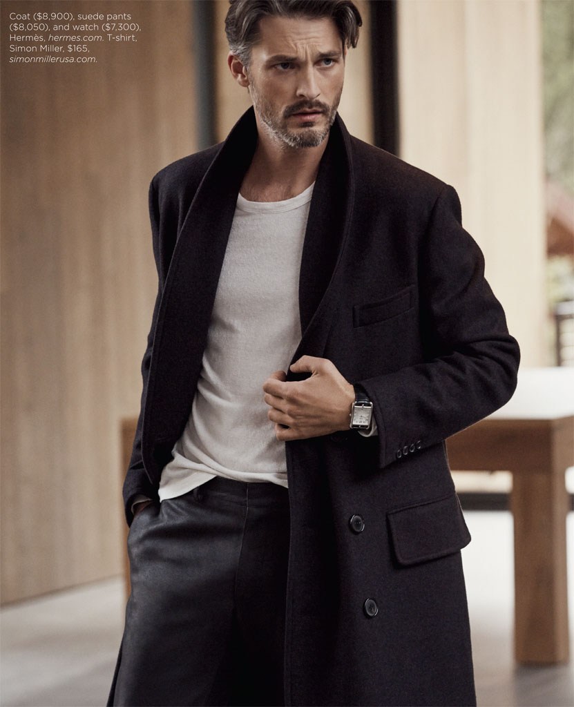 Ben Hill goes for a minimal look in a timeless black coat.